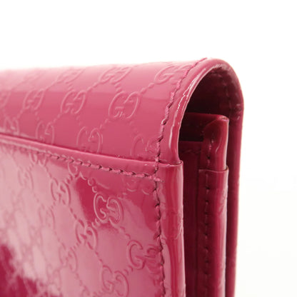 Gucci portefeuille vernis rose