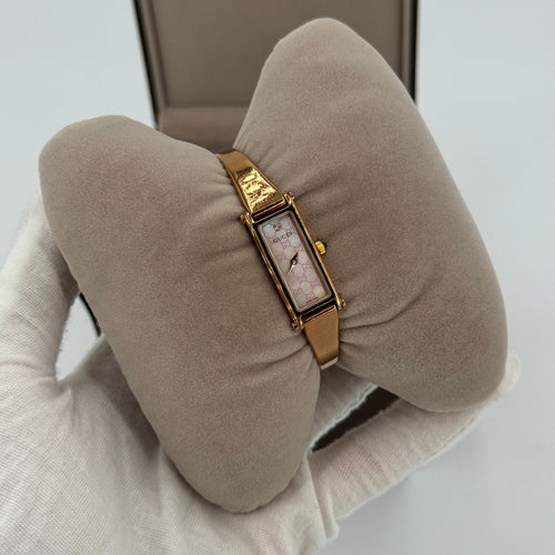 Gucci montre bracelet doré