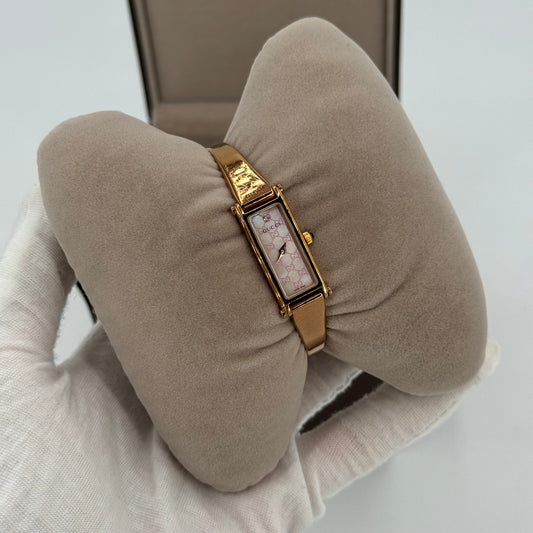 Gucci montre bracelet doré