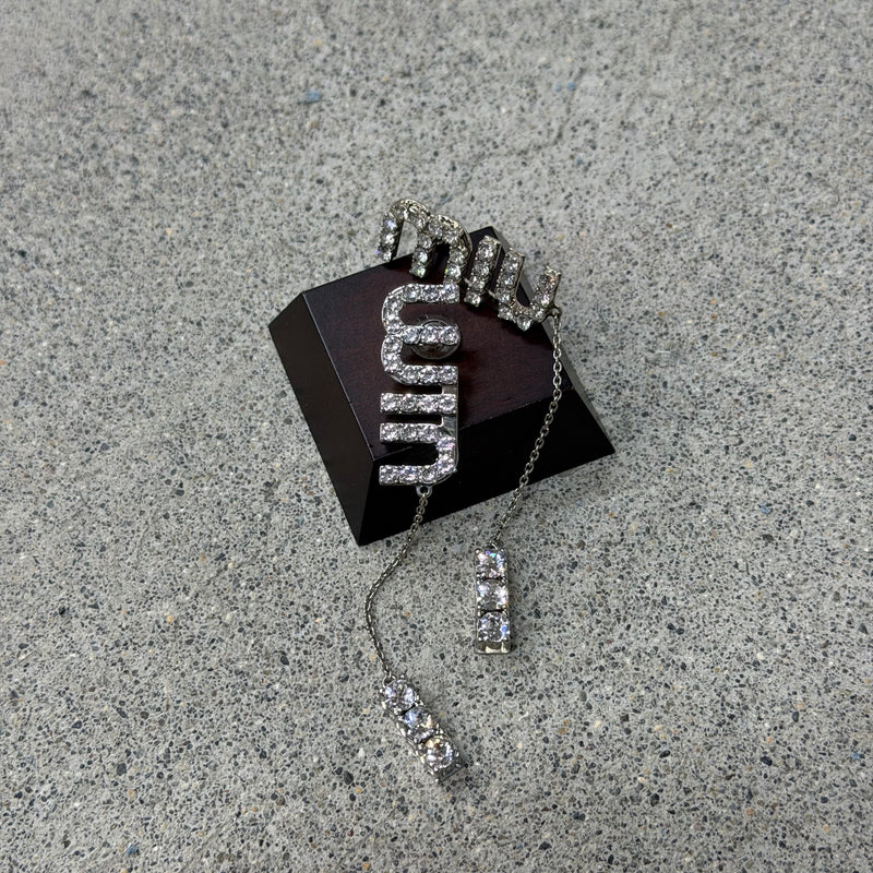 Miu Miu pendants d’oreilles