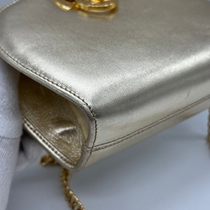 Ferragamo mini sac doré